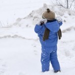 A child playing in the snow